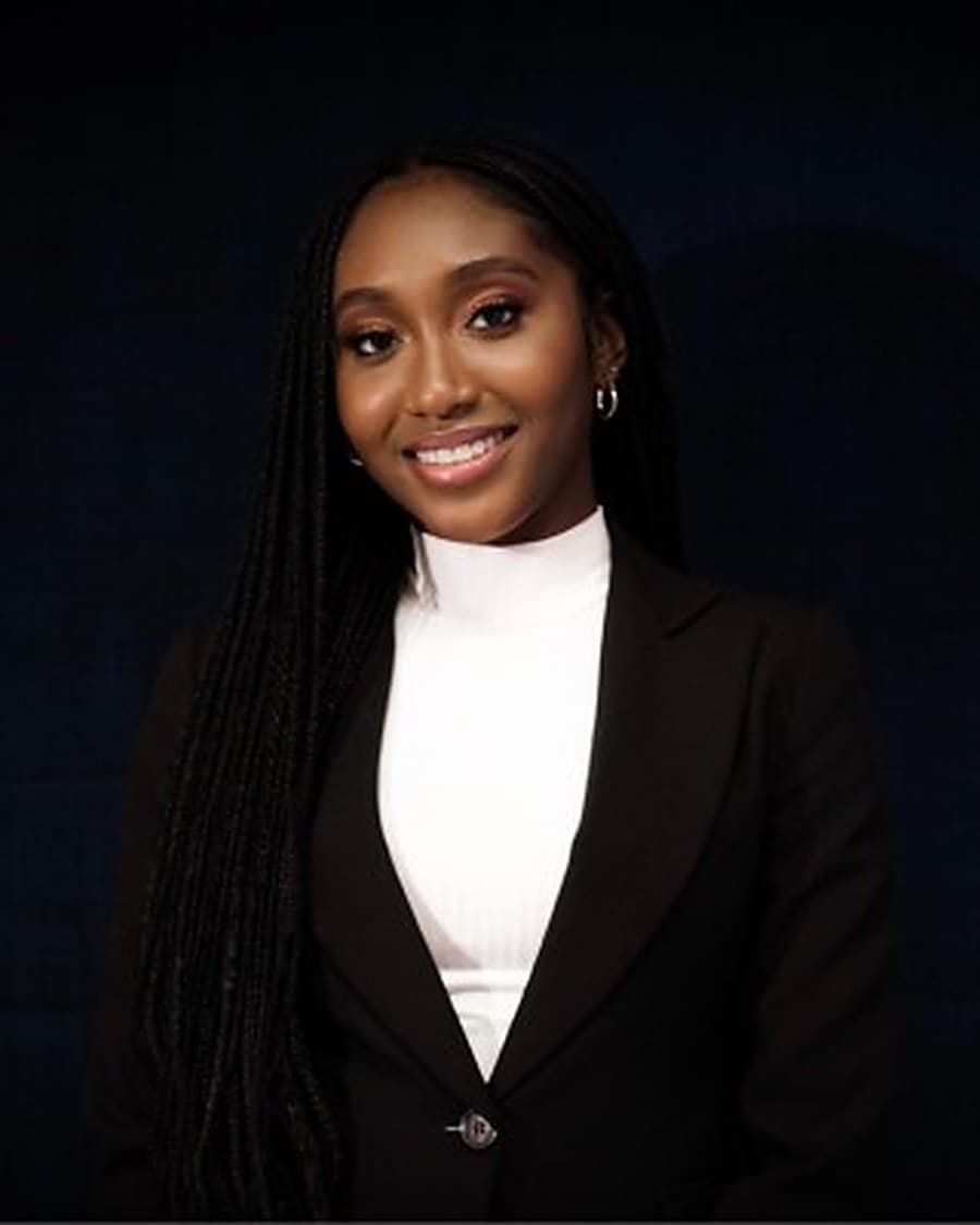 Noella A., Communications Associate
